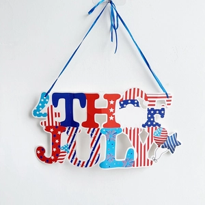 Detail of 4th of July hanging decoration featuring gnomes and patriotic stars and stripes