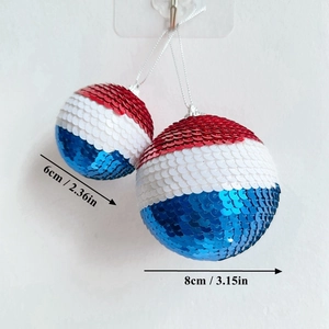 Close-up of 6cm and 8cm Independence Day sequin ornaments in red, white, and blue colors