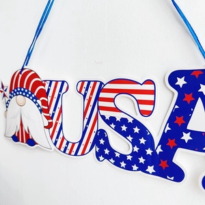 Detail of USA Independence Day gnome hanging ornament with stars and stripes pattern