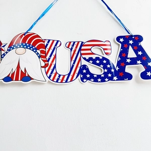 Detail of USA themed hanging gnome decoration with American flag stars and stripes pattern