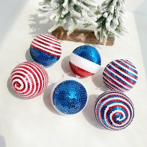 Close-up of red white and blue sequined hanging balls for Independence Day decor