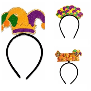 Three Mardi Gras headbands with purple, gold, and green glitter feathers and harlequin designs