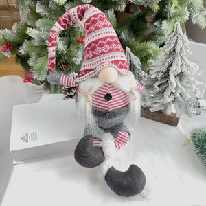 Detail of 60cm Christmas gnome decoration with Nordic knit hat and white faux fur beard