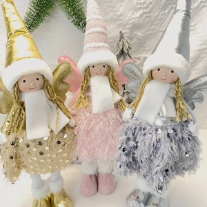 Three plush Christmas angel dolls with tall pointed hats and sequins in gold, pink, and silver