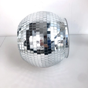 Close-up of mirrored disco ball planter with reflective square glass tiles and top opening