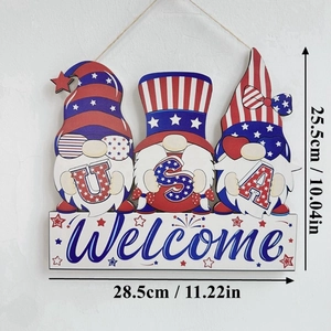 Detail view of Independence Day wood gnome sign with USA letters and Welcome text