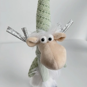 Detail showing green tweed hat and silver sequined reindeer antlers on Christmas gnome doll
