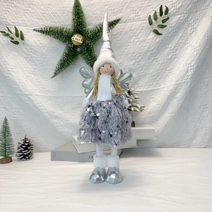 Close-up of a 56cm Christmas angel doll with silver sequins and lavender feather dress