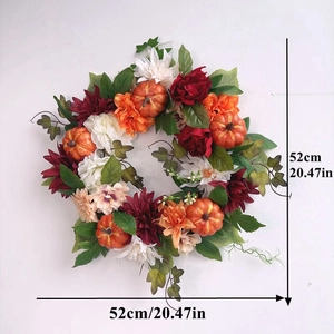 Detail shot of 52cm Halloween wreath featuring orange pumpkins and autumn florals