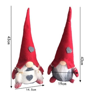 Dettaglio con dimensioni di altezza e larghezza per la coppia di gnomi di peluche