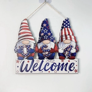 Close-up of USA gnomes wood sign with red white and blue patriotic welcome decoration