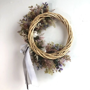 Rustic vine wreath with purple lavender, white mini pumpkins and a striped ribbon bow
