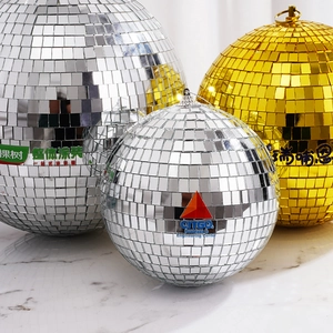 Silver and gold mirror disco balls in multiple sizes for party decor and event lighting