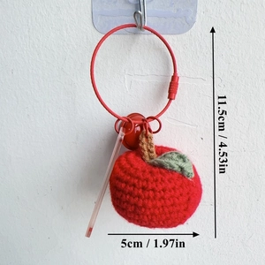 Handmade crochet apple keychain with red bell and leaf detail, size 11.5cm by 5cm