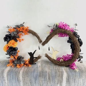Gothic moon cat wreaths with orange and purple flowers for Halloween door decoration