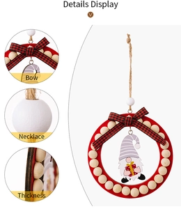 Close-up of Christmas gnome wood ornament showing bow details and material thickness