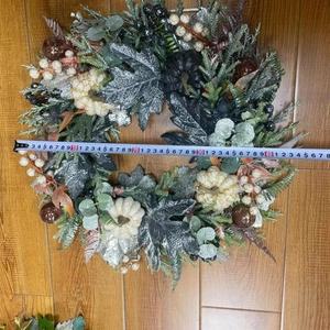 Close-up of autumn wreath with silver leaves and pumpkins measuring about 45cm diameter