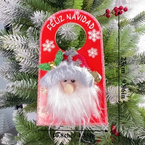 Detailed view of Santa door hanger with Feliz Navidad text and festive bell decoration