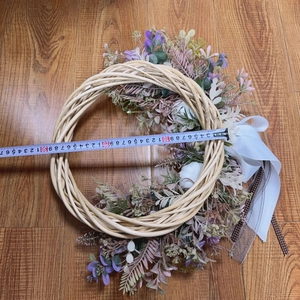 Handcrafted fall wreath with white pumpkins and checkered ribbons, measured at 35cm diameter