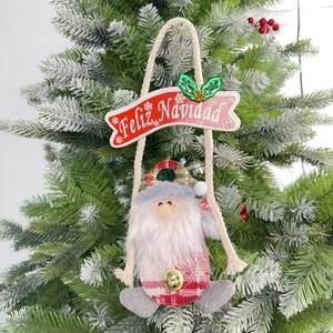 Plüsch Weihnachtsmann mit Feliz Navidad Schild und Glocke am Weihnachtsbaum