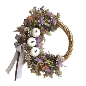 Autumn harvest wreath with white pumpkins, lavender flowers, and natural grapevine base
