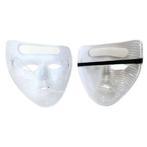 Detail view showing white plastic mask backs with foam padding and elastic headbands