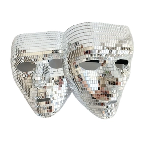 Detailed view of two disco ball mirror masks with hand-glued silver glass squares