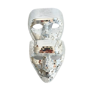 Detail of silver disco mirror party masks featuring reflective glass square tiles