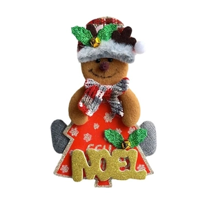 Gingerbread man Christmas ornament with Noel text, plaid scarf and small bells