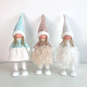 Three sequined Christmas angel dolls in blue, pink, and white for holiday decorations