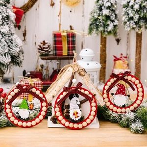 Three-piece set of wooden Christmas gnome round hanging ornaments with red beads and bows