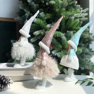 Sparkly angel doll ornaments with sequin hats and plush bodies for Christmas decor
