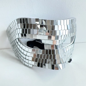 Close-up of handmade mirror disco ball face mask with silver square glass tiles