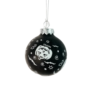Detail of black Halloween hanging ball ornament with white pumpkin and bat patterns