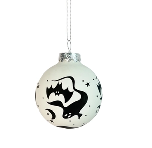 Close-up of Halloween ornament featuring hand-drawn ghost, bat, and moon patterns