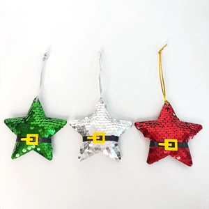 Close-up of three glitter star ornaments with Santa belt detail for Christmas tree decor
