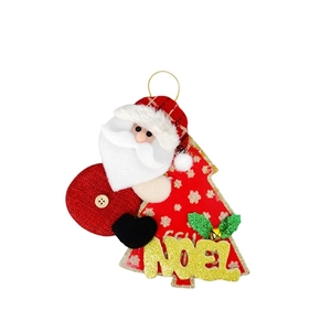 Detail of Christmas Santa ornament with red circular bag and gold Noel letter plaque