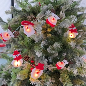 Christmas LED string lights with Santa Claus Snowman and Reindeer on a tree