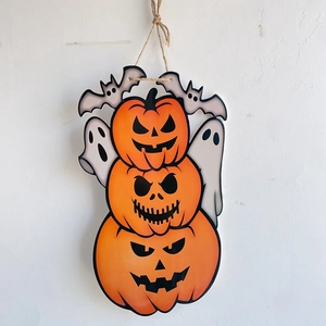 Halloween hanging sign with three orange pumpkins, small ghosts and bats on a rustic rope