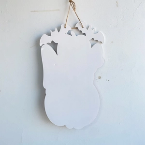 White Halloween pumpkin door hanger with bat silhouette and creative antler design