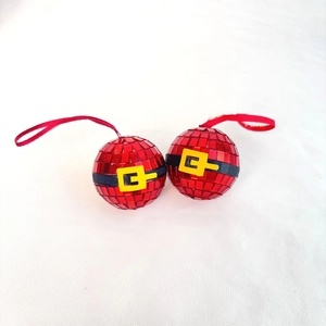 Close-up of red mirror disco balls with Santa belt design and silk hanging loops