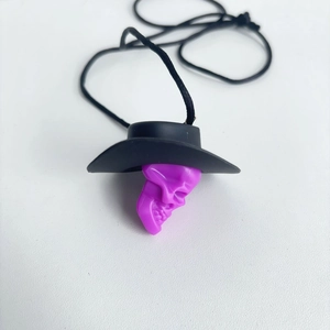 Halloween purple skull pendant necklace with black cowboy hat on a clean white background