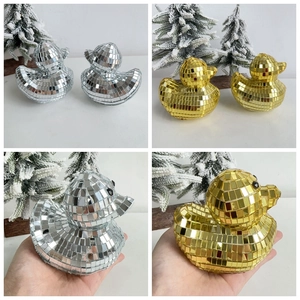 Detailed view of gold and silver disco ball mirror mosaic ducks for Christmas home decor