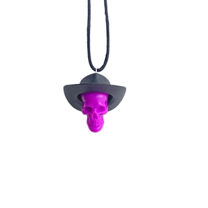 Halloween purple skull necklace with black cowboy hat pendant on white background