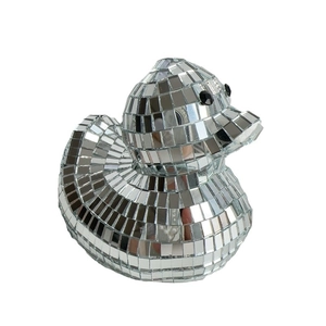 Detailed view of reflective silver disco ball mirror mosaic duck figurine for home decor
