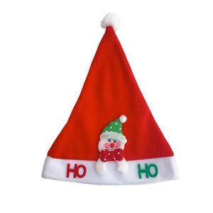 Detail of red Christmas hat with plush snowman figure and festive HO HO embroidery design