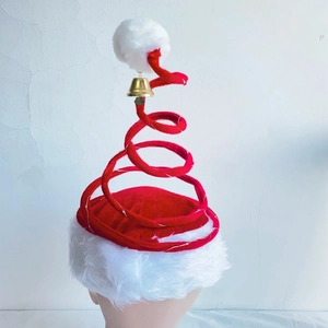 Unique spring spiral Christmas hat featuring red velvet, plush trim and a golden bell