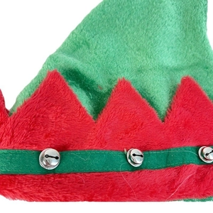 Close-up of plush Christmas elf hat with red zigzag trim and silver jingle bells