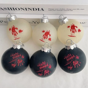 Detail of Halloween bloody handprint decorative balls with Wanna Play slogan text