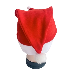 Rear view of festive Christmas hat in red plush fabric with white pompom on top